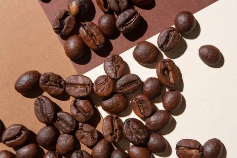 Coffee beans viewed from above on a background of different colors Stock Photos