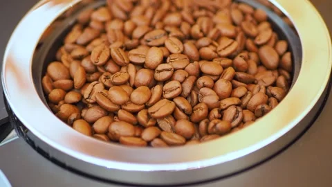 Coffee beans was grinded with an electric grinder Stock Footage 137808793