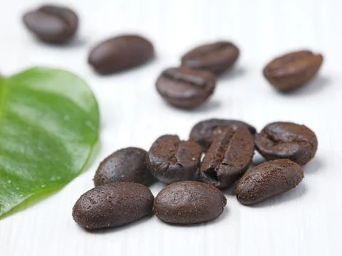 Coffee beans on a white background. Stock Photos