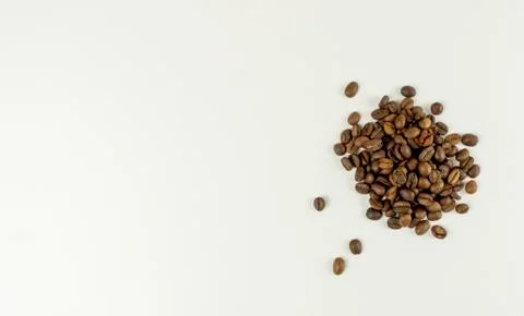 Coffee beans on a white background. place for text. Top view. Flat lay. Mocku Stock Photos