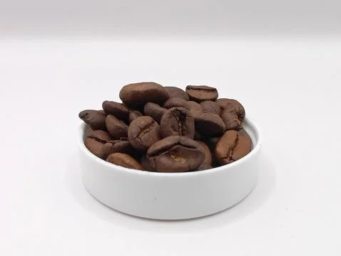 Coffee beans on white Stock Photos