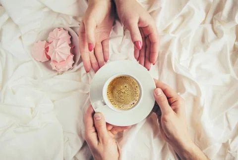 Coffee in bed. Selective focus. Love drink. Stock Photos