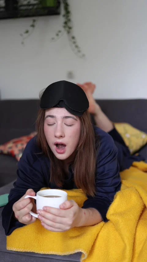 Coffee in bed starts her perfect morning 스톡 동영상 340087064