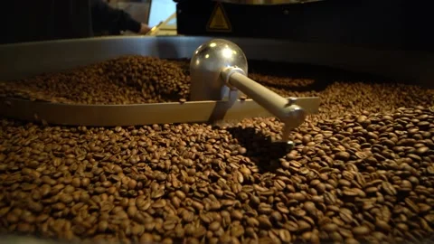 Coffee Being Mixed In A Coffee Roasting Machine. Mixing Coffee. Stock Footage 196187500