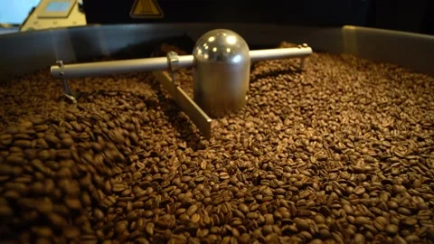 Coffee Being Mixed In A Coffee Roasting Machine. Mixing Coffee. Stock Footage 196187555