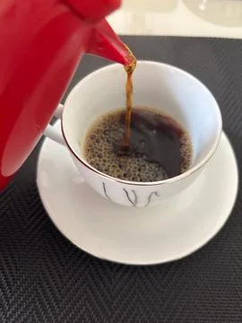 Coffee being served in a cup Stock Photos