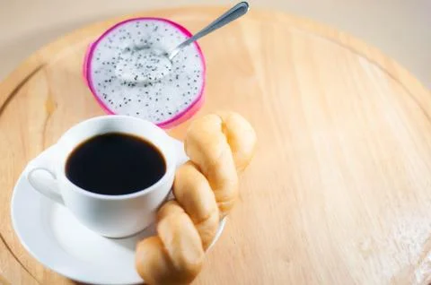 Coffee, bread, dragon fruit Breakfast Stock Photos
