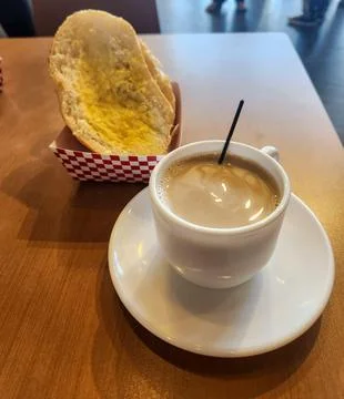 Coffee with bread on the table Stock Photos