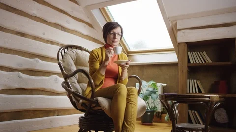 Coffee break on attic Stock Footage 100286257