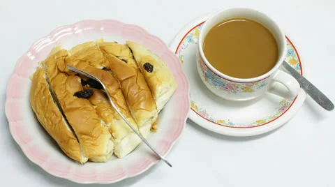 Coffee break with bread, stop motion Stock Footage