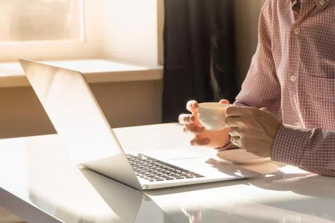 Coffee break in bright office.  Fotos Stock