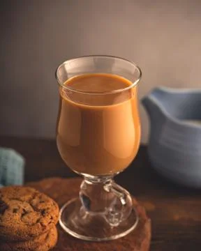 Coffee break composition with glass Stock Photos