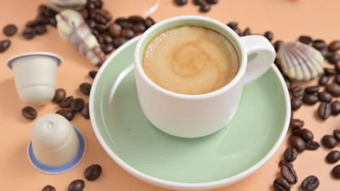 Coffee break. A cup of aromatic espresso coffee with froth. Traditional Italian Video stock 148726125