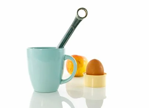 Coffee break during work with apple and egg Stock Photos