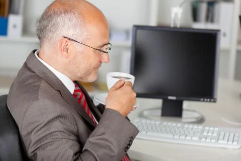 Coffee break in the office Stock Photos