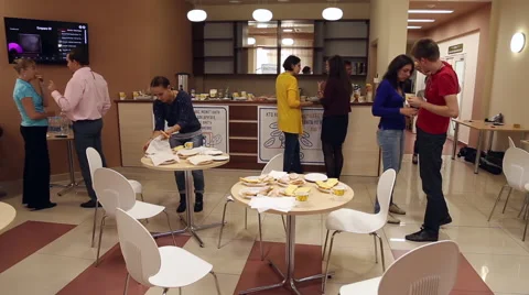 Coffee break, people talk and eat in the bar Stock Footage 67355018