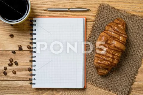 Coffee break with snack Stock Photos