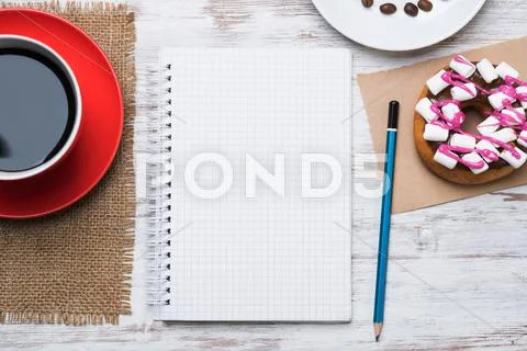 Coffee break with snack Stock Photos