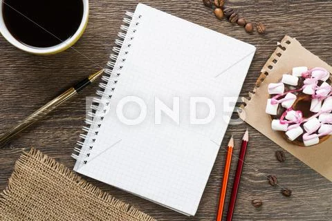 Coffee break with snack Stock Photos
