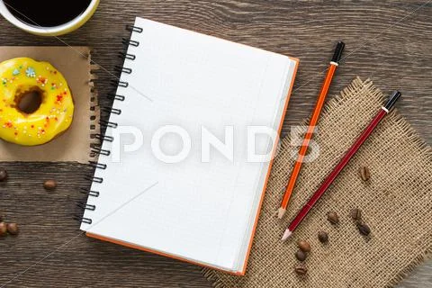 Coffee break with snack Stock Photos