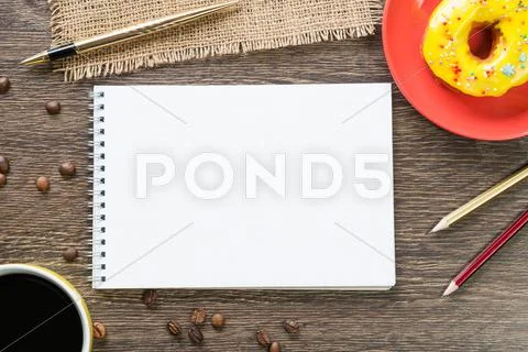 Coffee break with snack Stock Photos