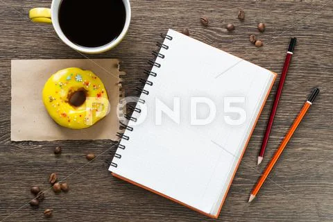 Coffee break with snack Stock Photos