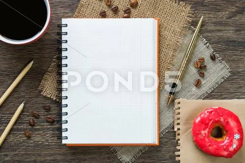 Coffee break with snack Stock Photos