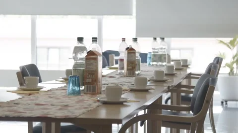 Coffee Break Table Setting in Seminar Room, Cups Bottles and Juice, Wide Shot Vídeo Stock 341519226