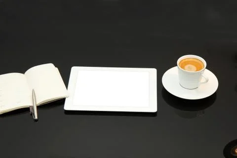 Coffee break with tablet pc Stock Photos