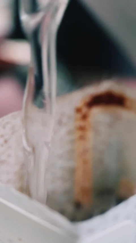 Coffee brewing, drip coffee, alternative coffee brewing methods, close up, macro Stock Footage 256746789