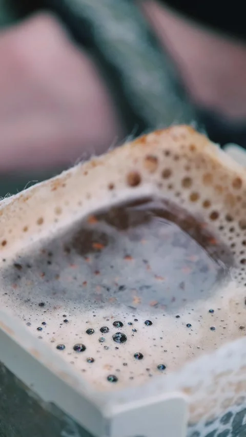 Coffee brewing, drip coffee, alternative coffee brewing methods, close up, macro Stock Footage 256746825