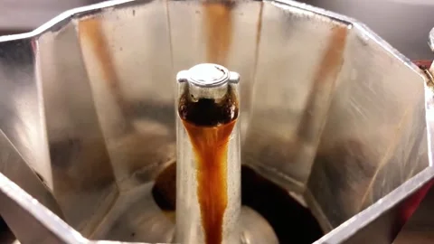 Coffee Brewing in Moka Pot with Hot Coffee Flowing from Spout Stock-Footage 329280597