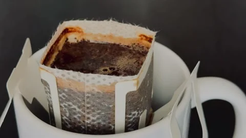 Coffee brewing process using drip bag. Stock Footage 294929148