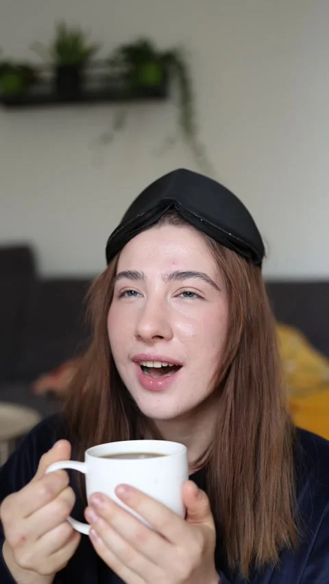 Coffee brings back her energy and smile Stock-Footage 340087331