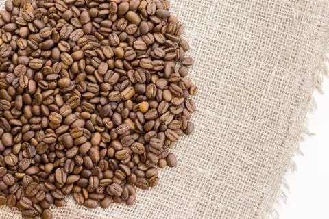 Coffee on burlap Stock Photos