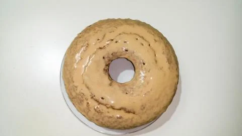 Coffee cake with icing Stock Photos