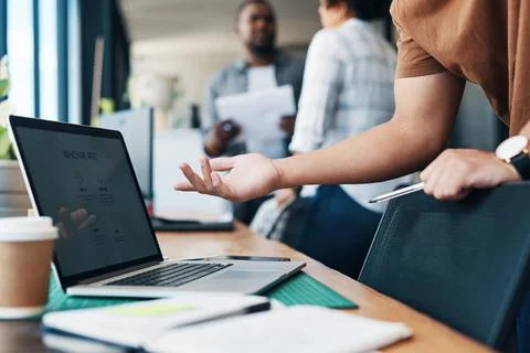 Coffee can solve any problem. Shot of an unrecognizable businessman using a Foto stock