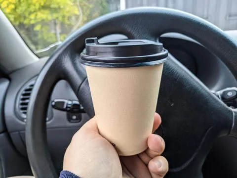 Coffee in the car Stock Photos