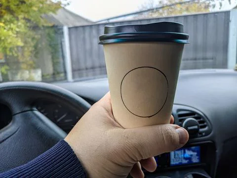 Coffee in the car Fotos de archivo