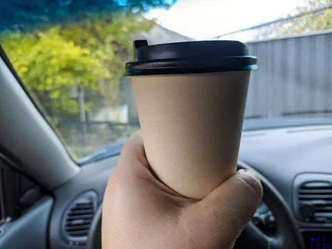 Coffee in the car Stock Photos