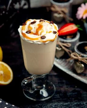 Coffee caramel latte on the table Stock Photos