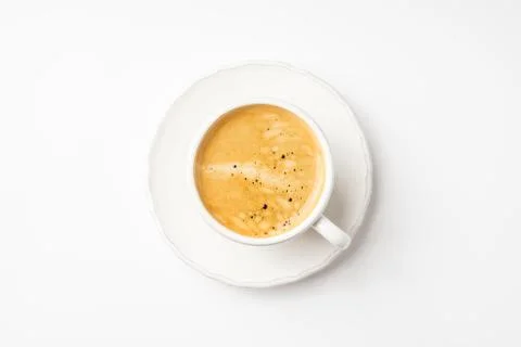 Coffee in ceramic cup on a white table Stock Photos