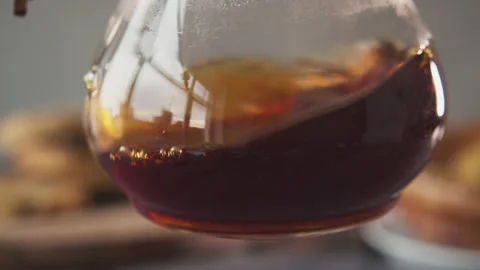Coffee in a chemex jar with coffee inside on a wooden table on a coffee shop Stock Footage 140201669