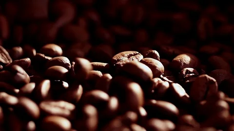 Coffee close up. Coffee beans. Coffee beans. Sunshine on coffee seeds. Slow Stock Footage 86546923