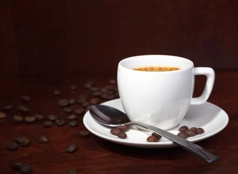 Coffee with coffee-beans Stock Photos