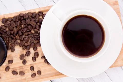 Coffee with coffee beans table top view Stock Photos