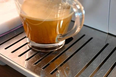 Coffee in Coffee Machine Close-Up, Brewing Process Concept Stockfoto's