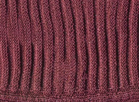 Coffee colored wool sweater texture. Handmade brown vermillion knitted wool s Stock Photos
