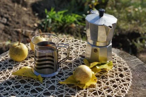 Coffee composition  with Autumn leaveson rustic background Stock Photos