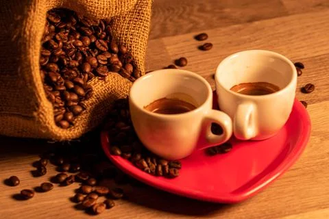 Coffee composition with grains and cups Stock Photos